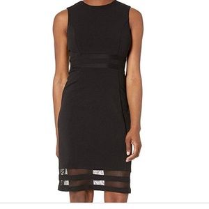 Sleeveless black sheath dress